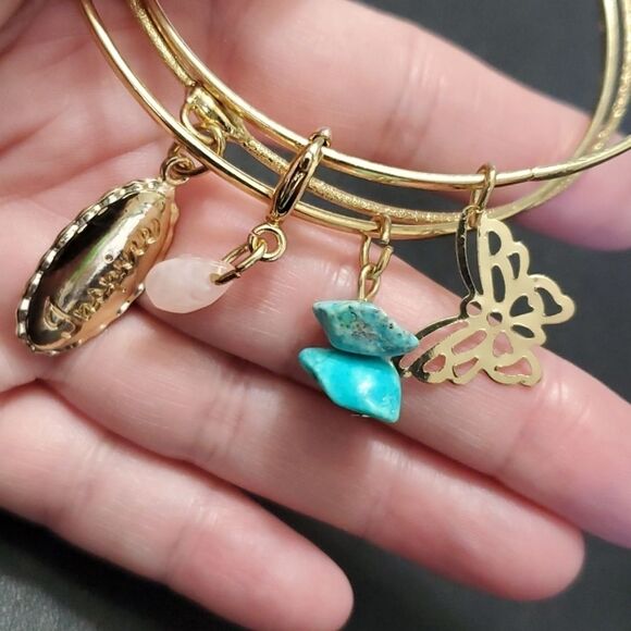 Gold tone layered bracelet with charms - Picture 9 of 9